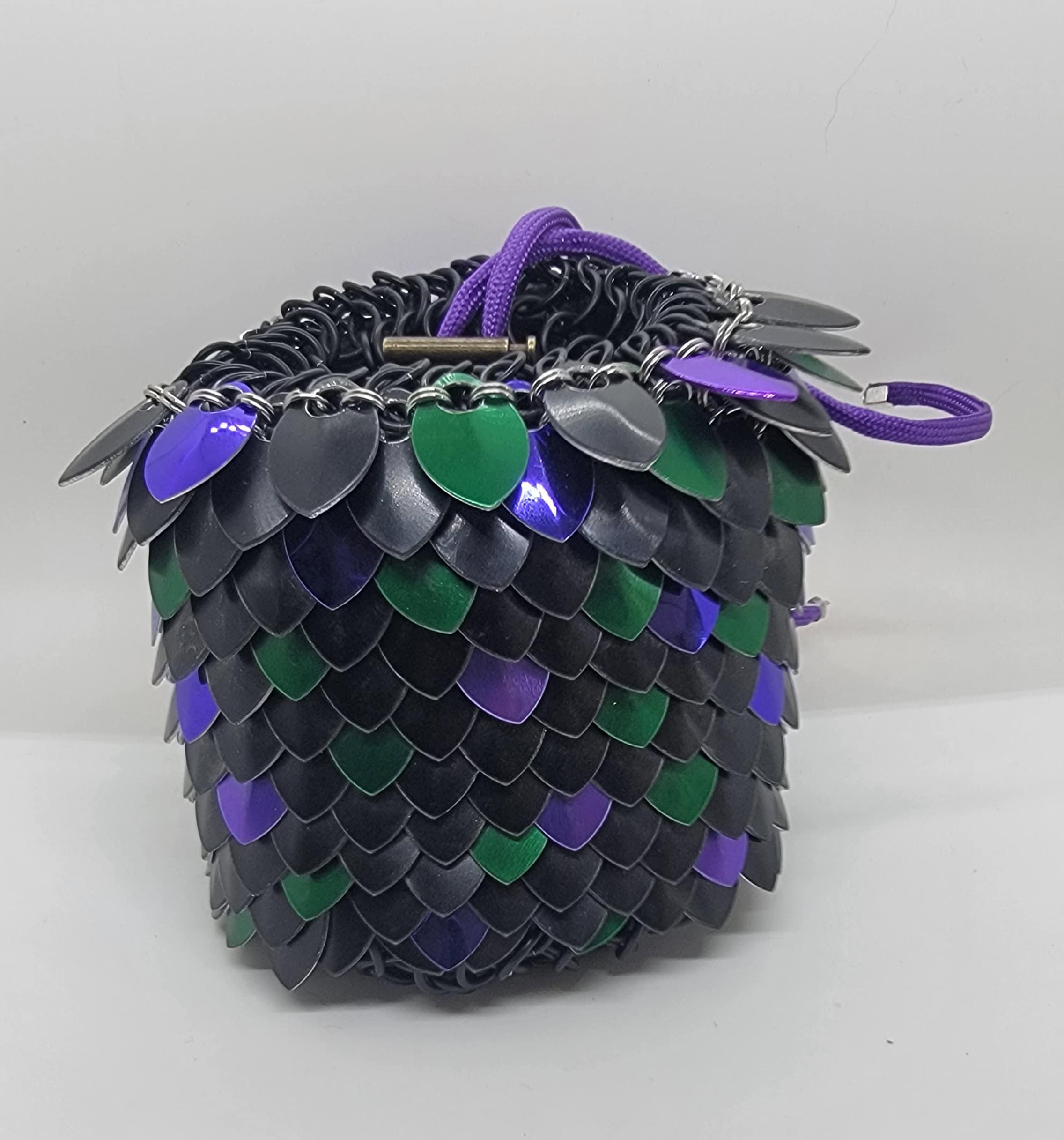 Scale maille dice bag with black inner liner and green/purple/black scales