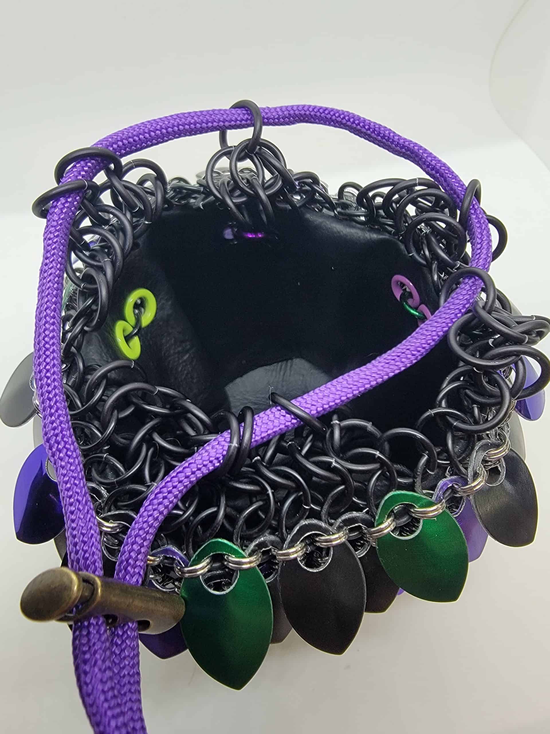 Scale maille dice bag with black inner liner and green/purple/black scales