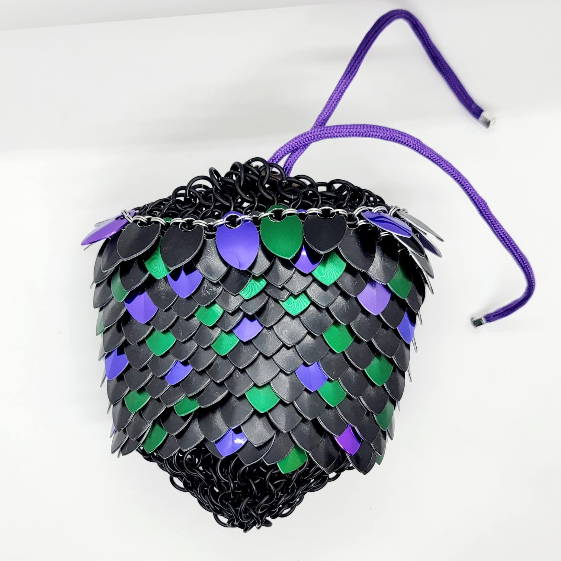 Scale maille dice bag with black inner liner and green/purple/black scales